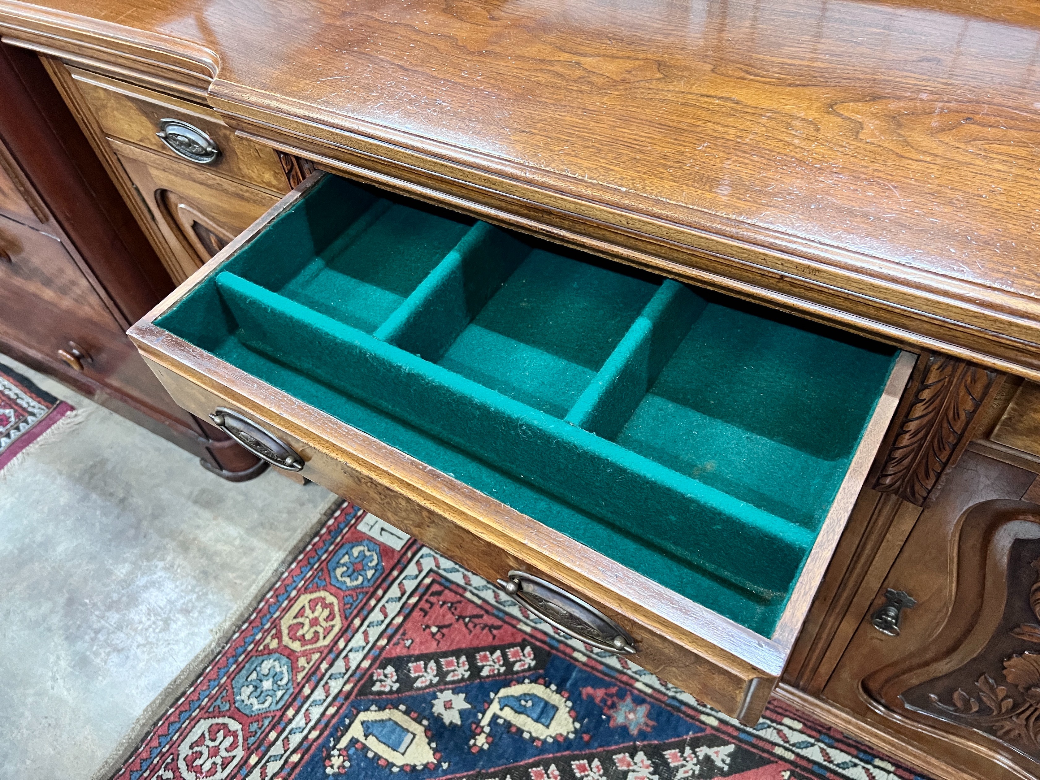 A late Victorian carved walnut breakfront sideboard, length 153cm, depth 52cm, height 107cm *Please note the sale commences at 9am.